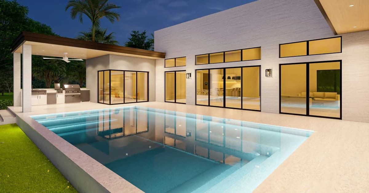 Modern luxury villa on Costa del Sol for large groups featuring infinity pool, outdoor kitchen with BBQ, floor-to-ceiling glass doors, palm trees, and nighttime lighting