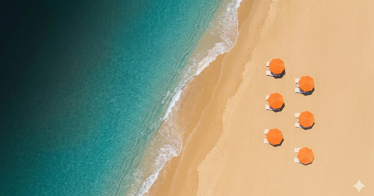 Sunny Costa del Sol beach with golden sand, turquoise sea, palm trees