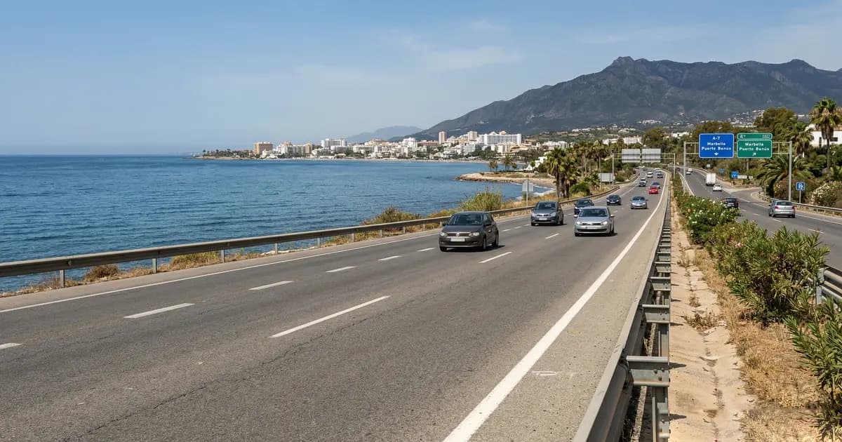 The A-7 coastal highway approaching Marbella with the Mediterranean visible on the left