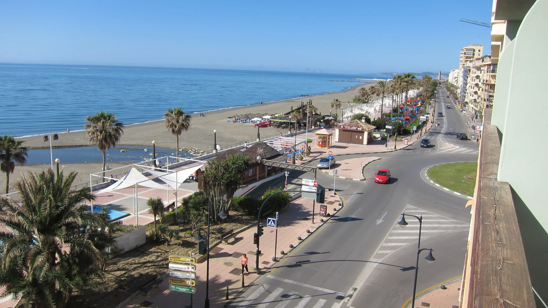 Elevated view over Estepona's seafront promenade, beach and palm trees on the Costa del Sol