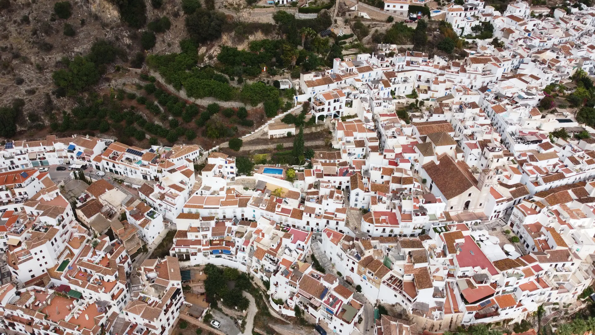Aerial view of Frigiliana, a whitewashed Moorish village in the Sierra de Almijara mountains above the Costa del Sol