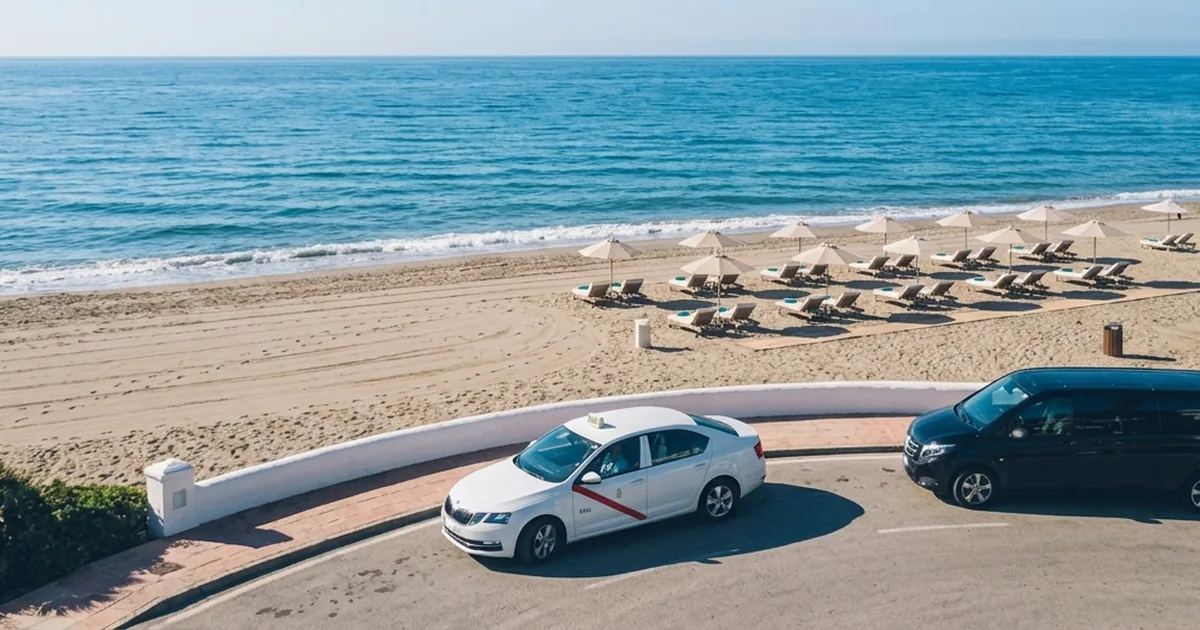 Beachfront loungers and taxi arrival near Iberostar Marbella Coral Beach