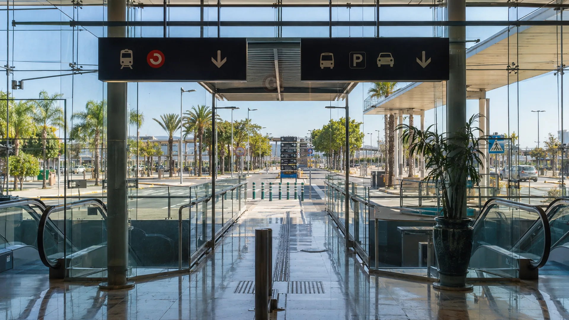 Málaga Airport arrivals area with Costa del Sol transport connections toward Benalmádena
