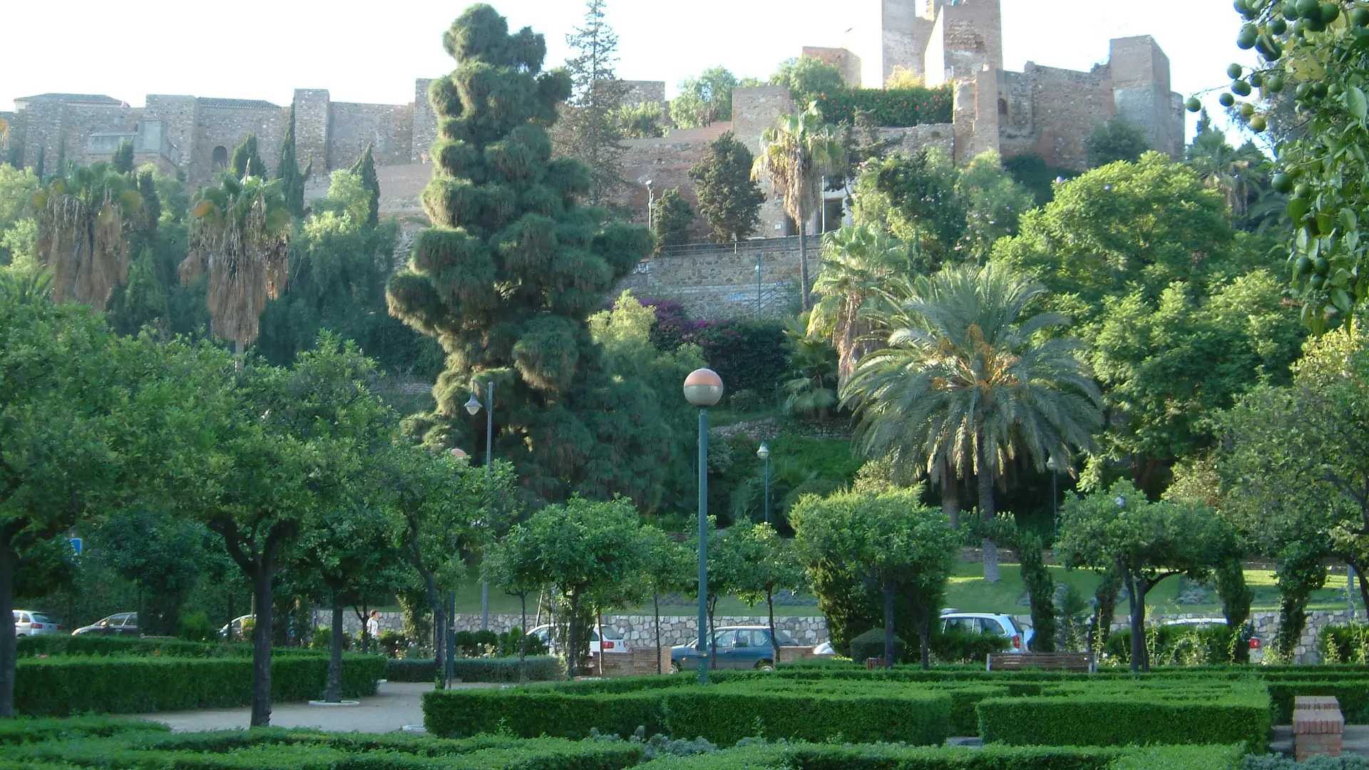 The Alcazaba fortress rising above the gardens of Malaga's old town