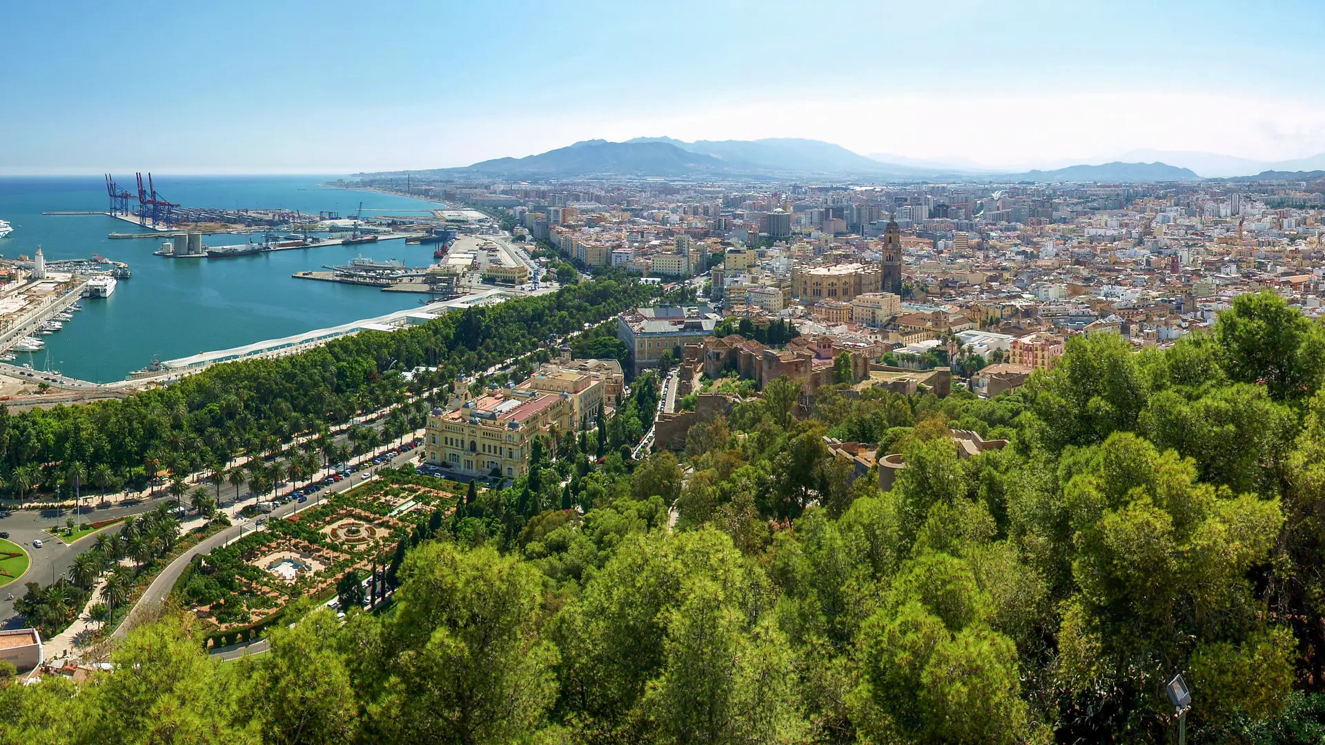 Panoramic view of Málaga from Gibralfaro, with the bullring, port and city along the coast