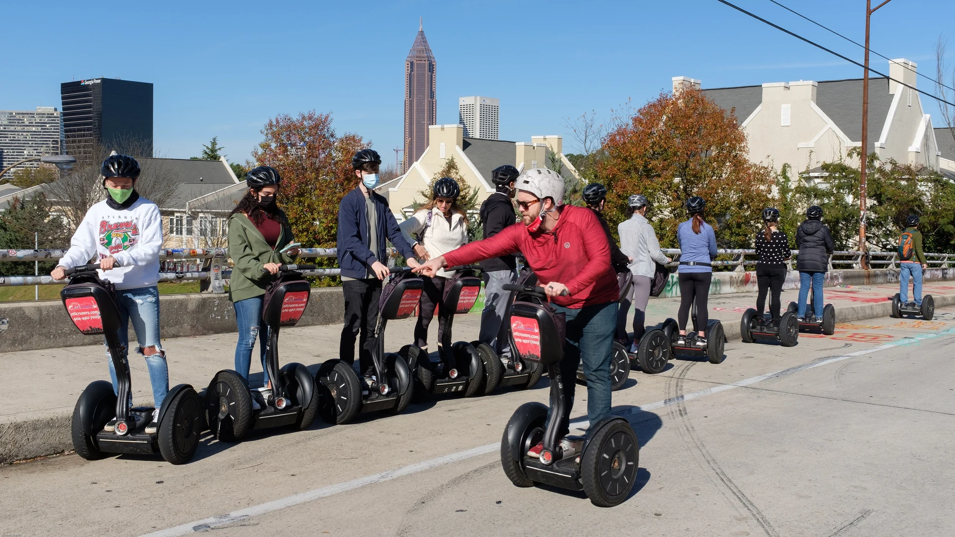 A group of riders on Segway personal transporters on a guided city tour