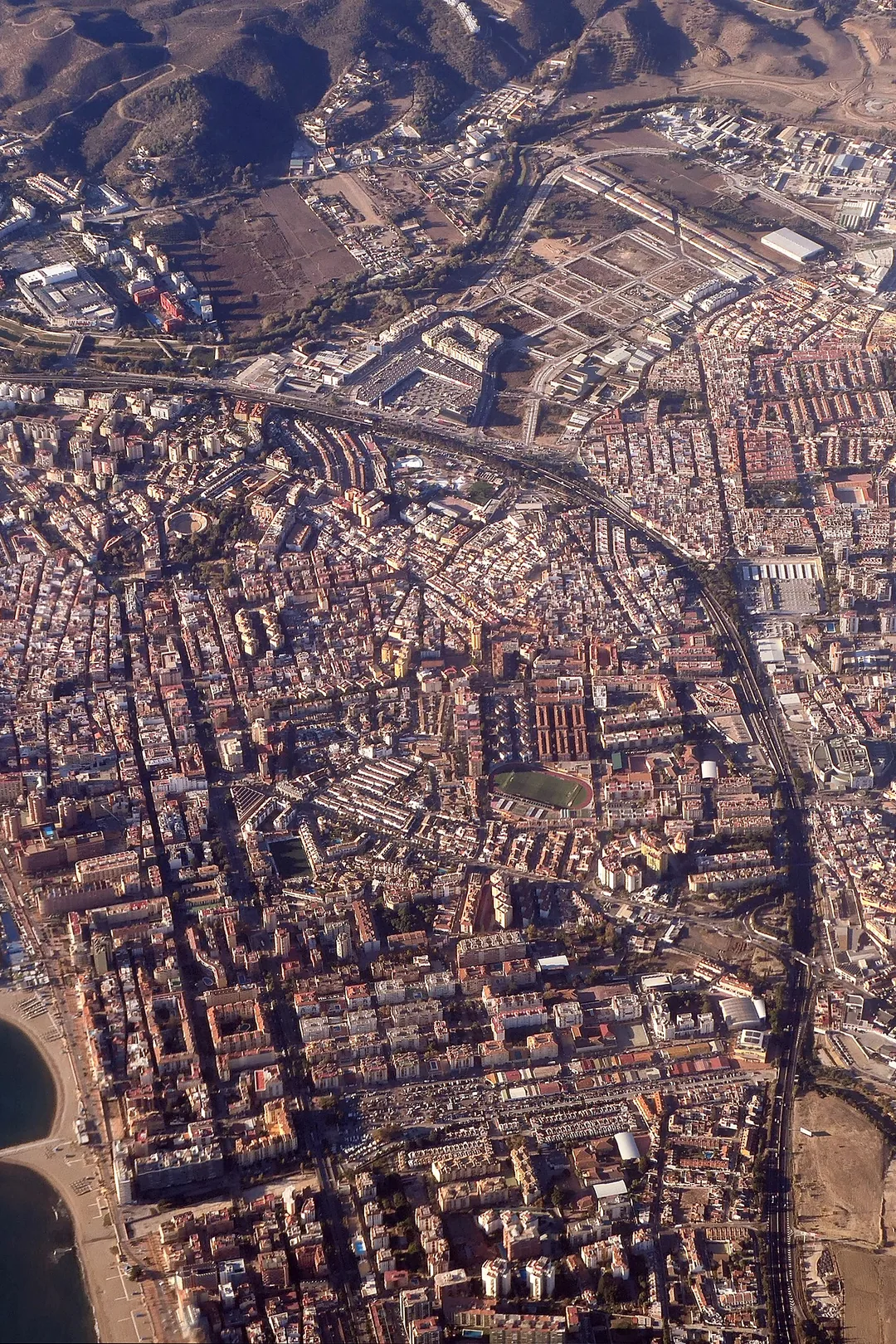 Aerial view of Fuengirola's seafront and town along the Costa del Sol coastline