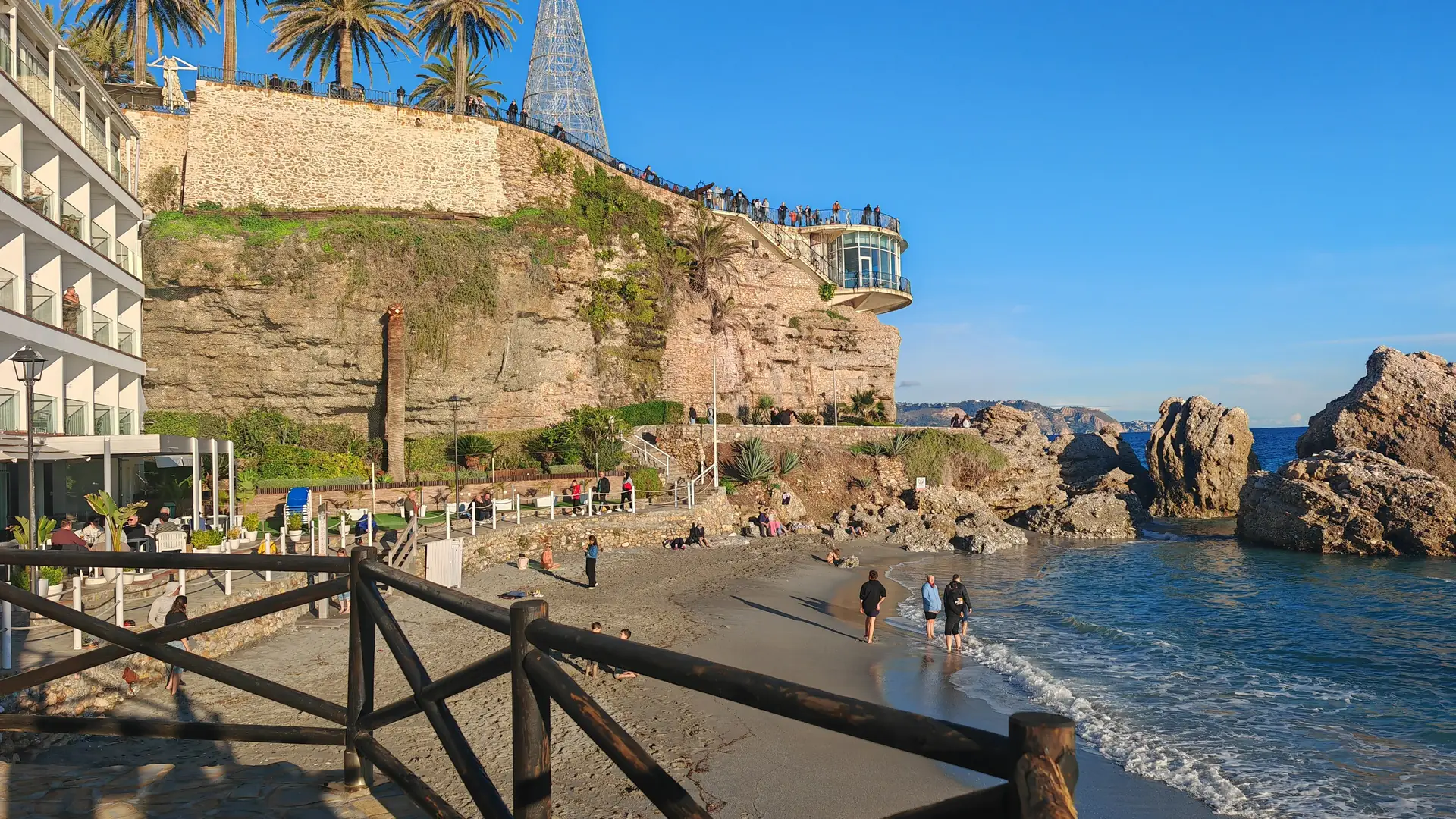 The palm-lined Balcón de Europa promenade in Nerja jutting over the Mediterranean Sea