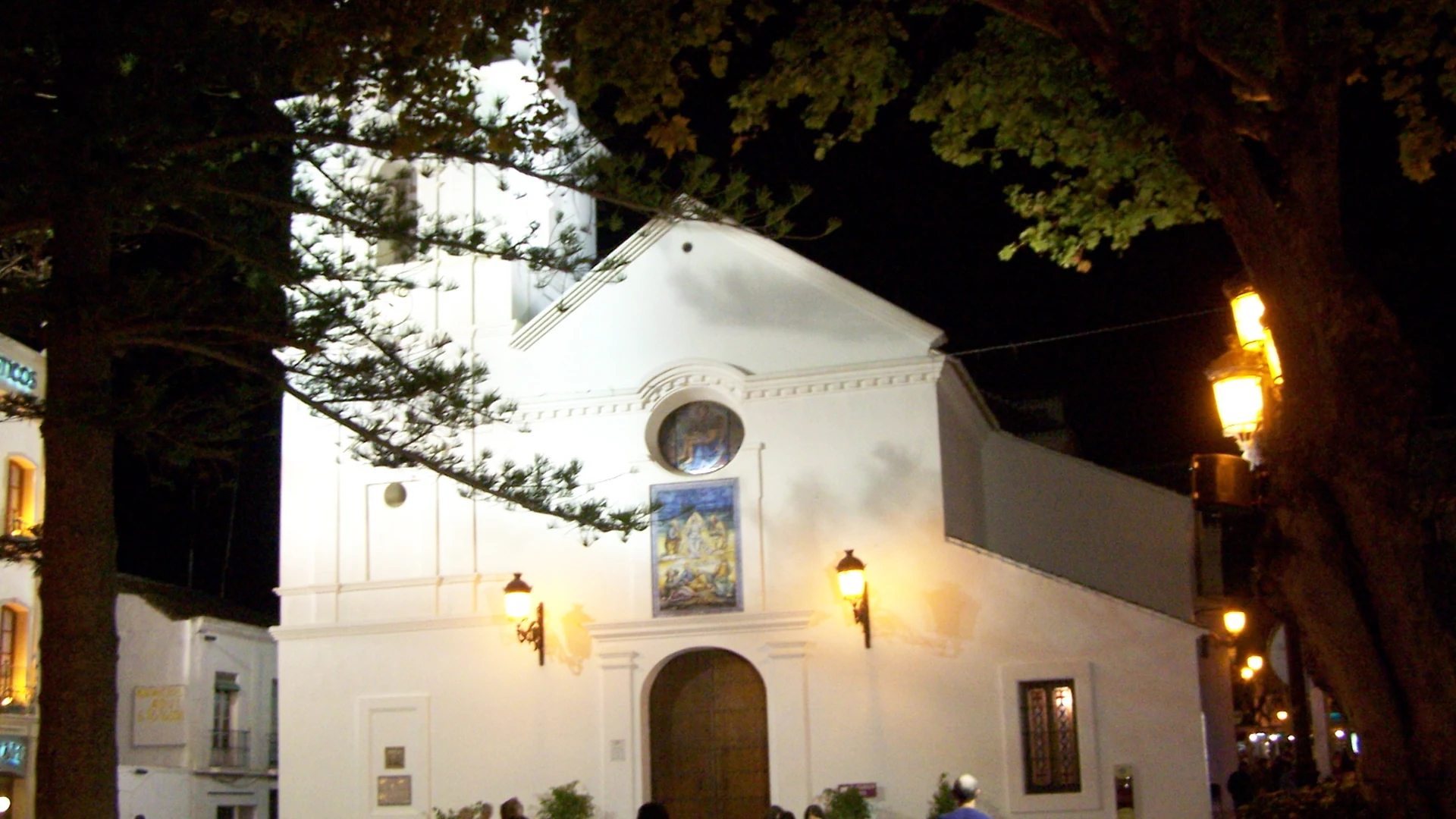 The illuminated El Salvador church in Nerja's old town at night