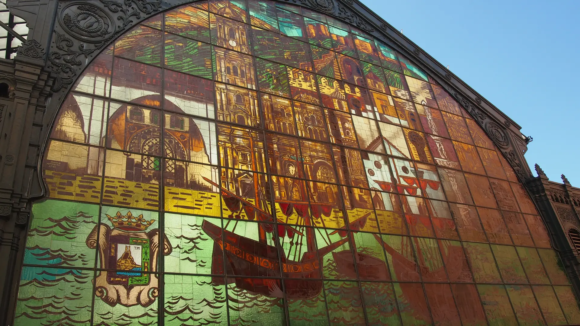 The neo-Arabic stained glass window inside the covered Atarazanas market in Málaga