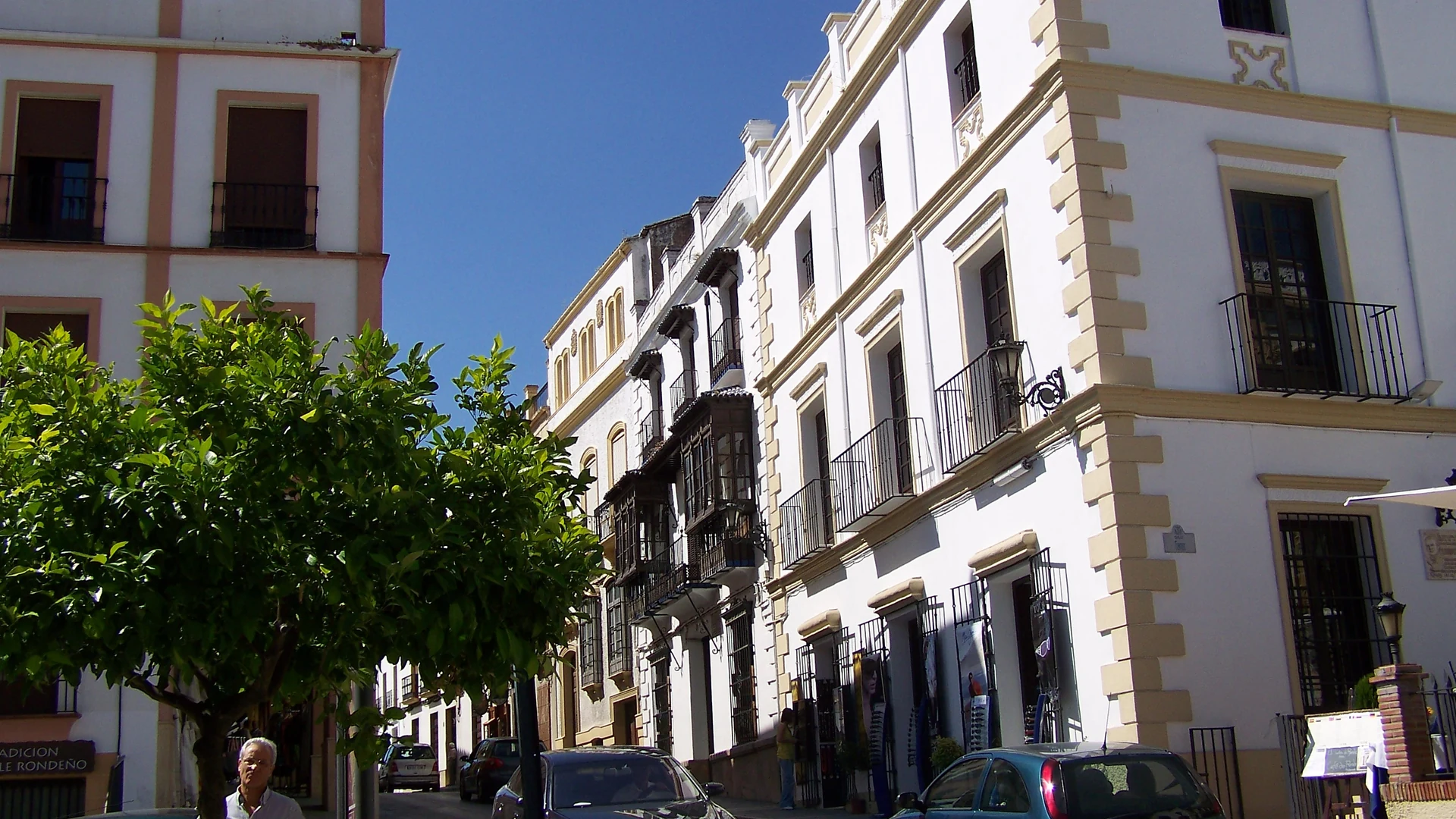 Calle Sevilla, a historic street in Ronda's town centre lined with traditional buildings