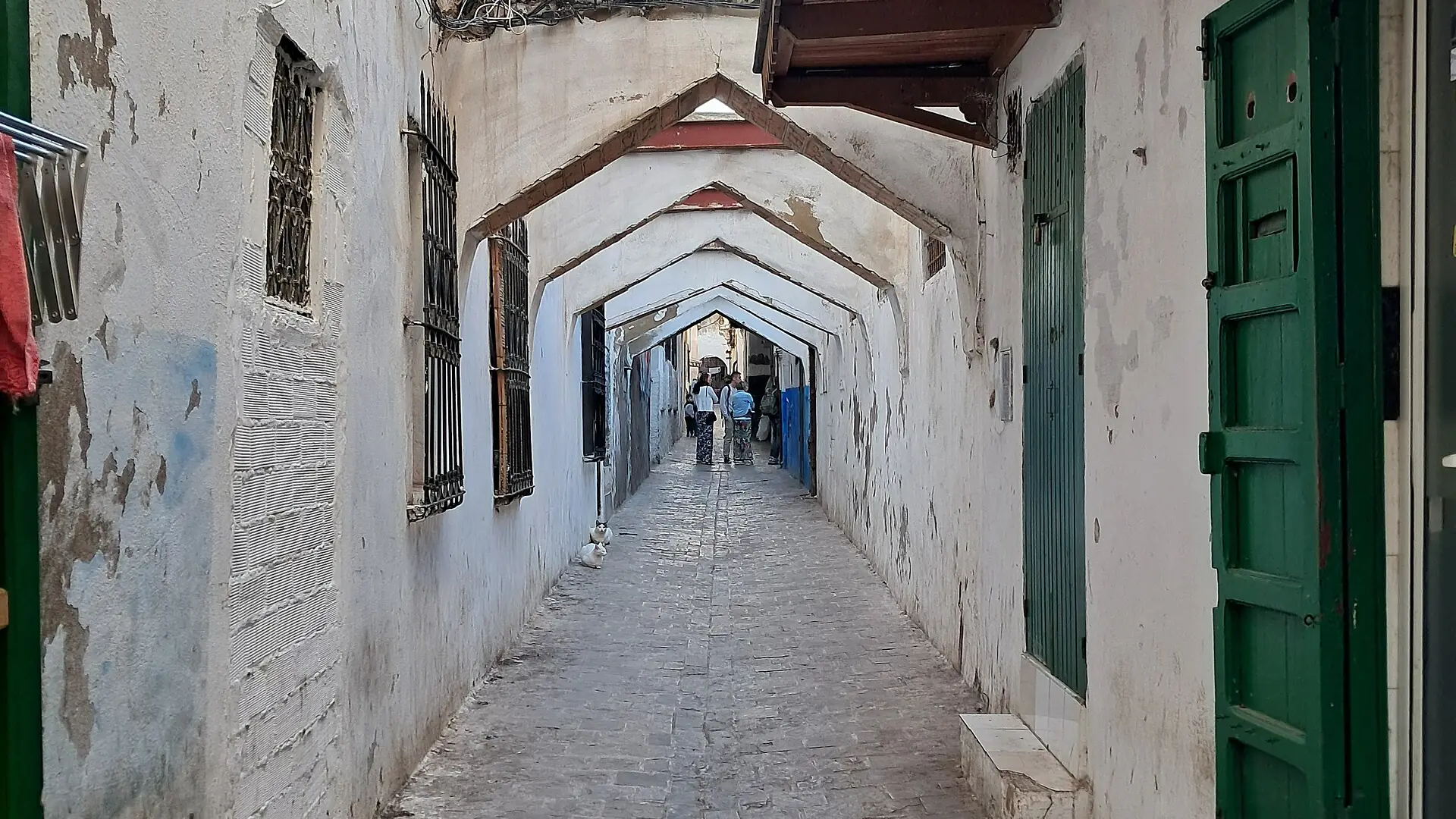White walls and green doors of Tetouan medina, a UNESCO World Heritage Site in northern Morocco