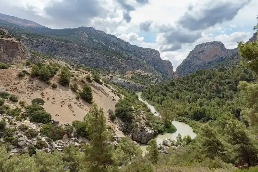 The Guadalhorce river winding through the Gaitanes Gorge below the El Chorro peaks