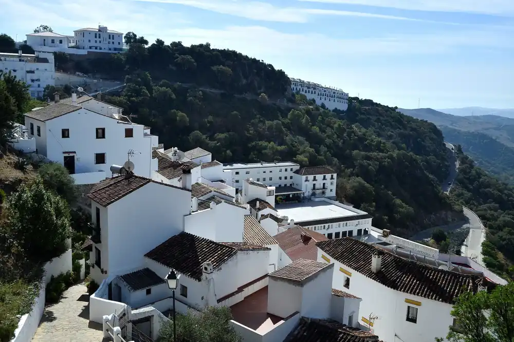 The white houses of Casares cascading down a clifftop hillside in Málaga province