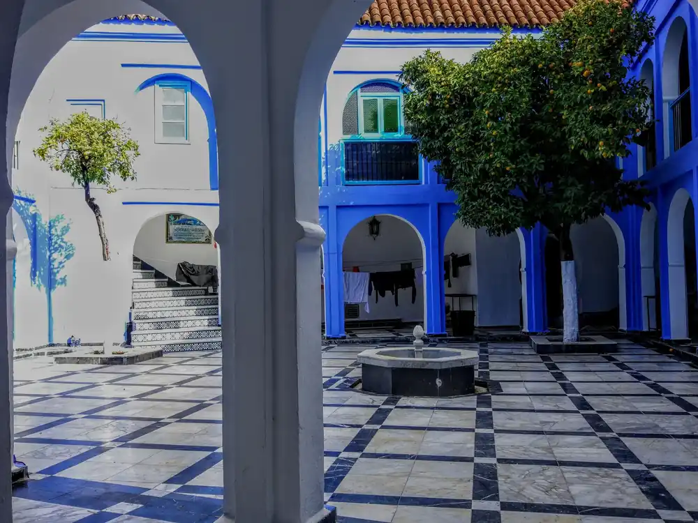 The blue-painted streets and courtyard of Chefchaouen in northern Morocco